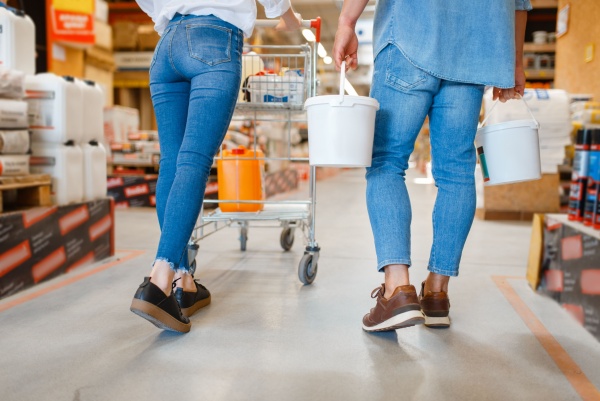 happy-consumers-with-a-cart-in-hardware-store-MFSDKYX-min (1)